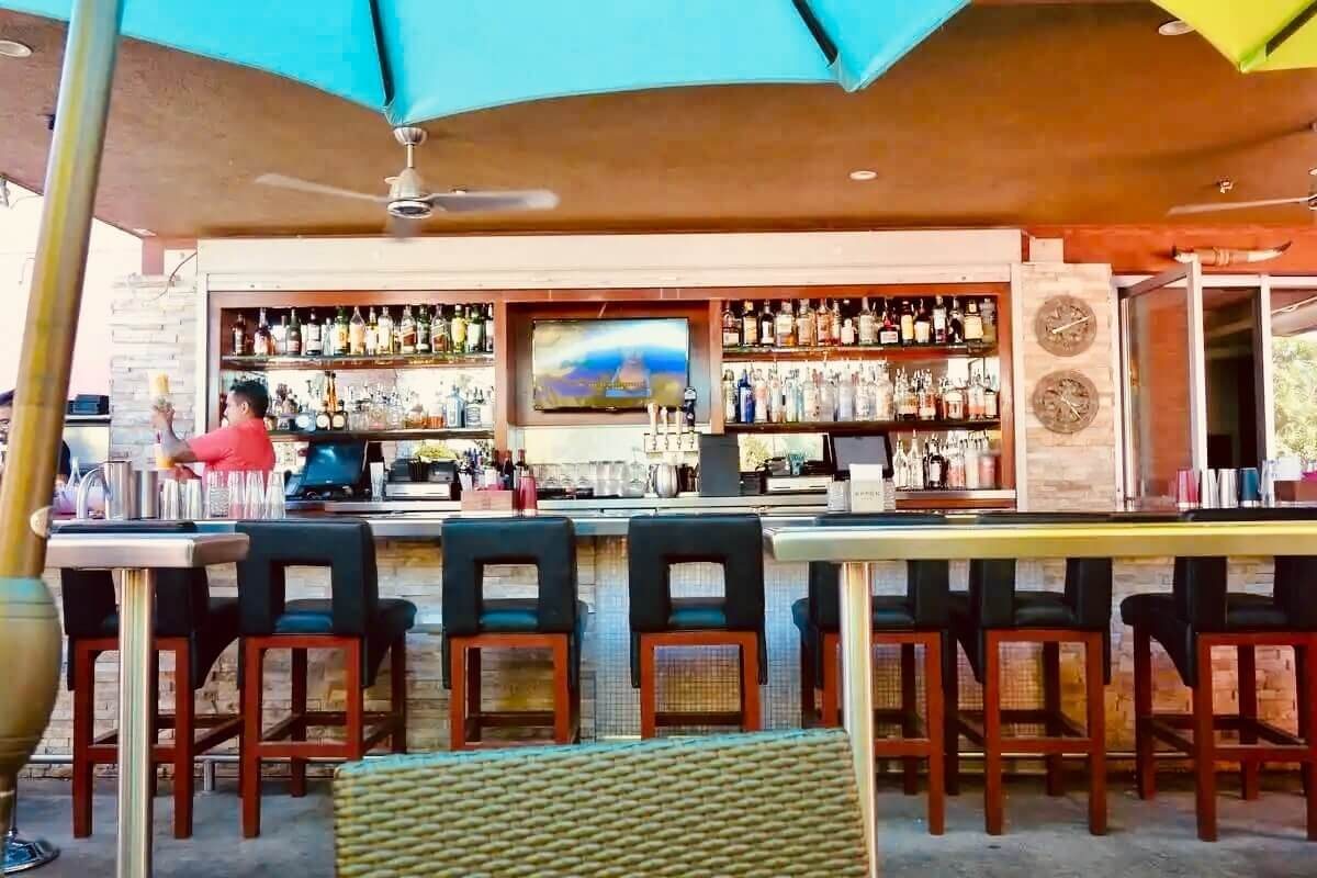 Tropicale restaurant palm springs outdoor bar from the original Tropicale Palm Springs: Secrets & Tips from Locals guide