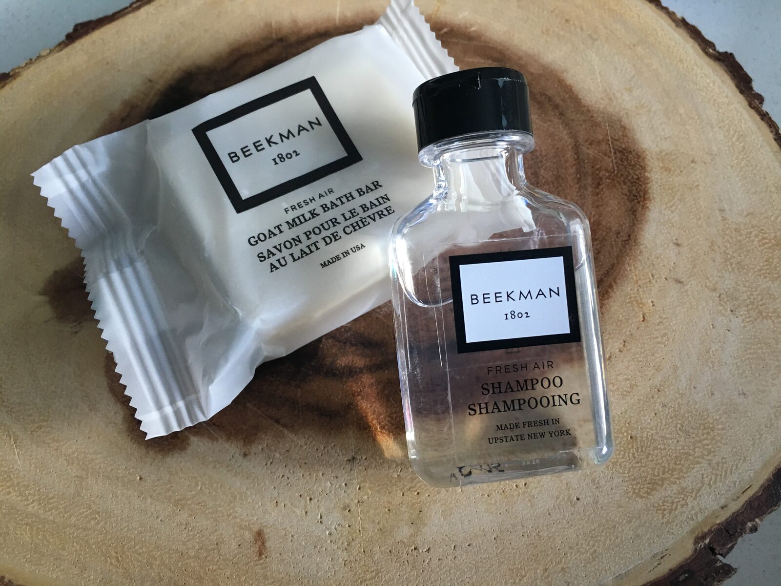 5 Palms Estate Beekman bath amenity kit on a rustic tray