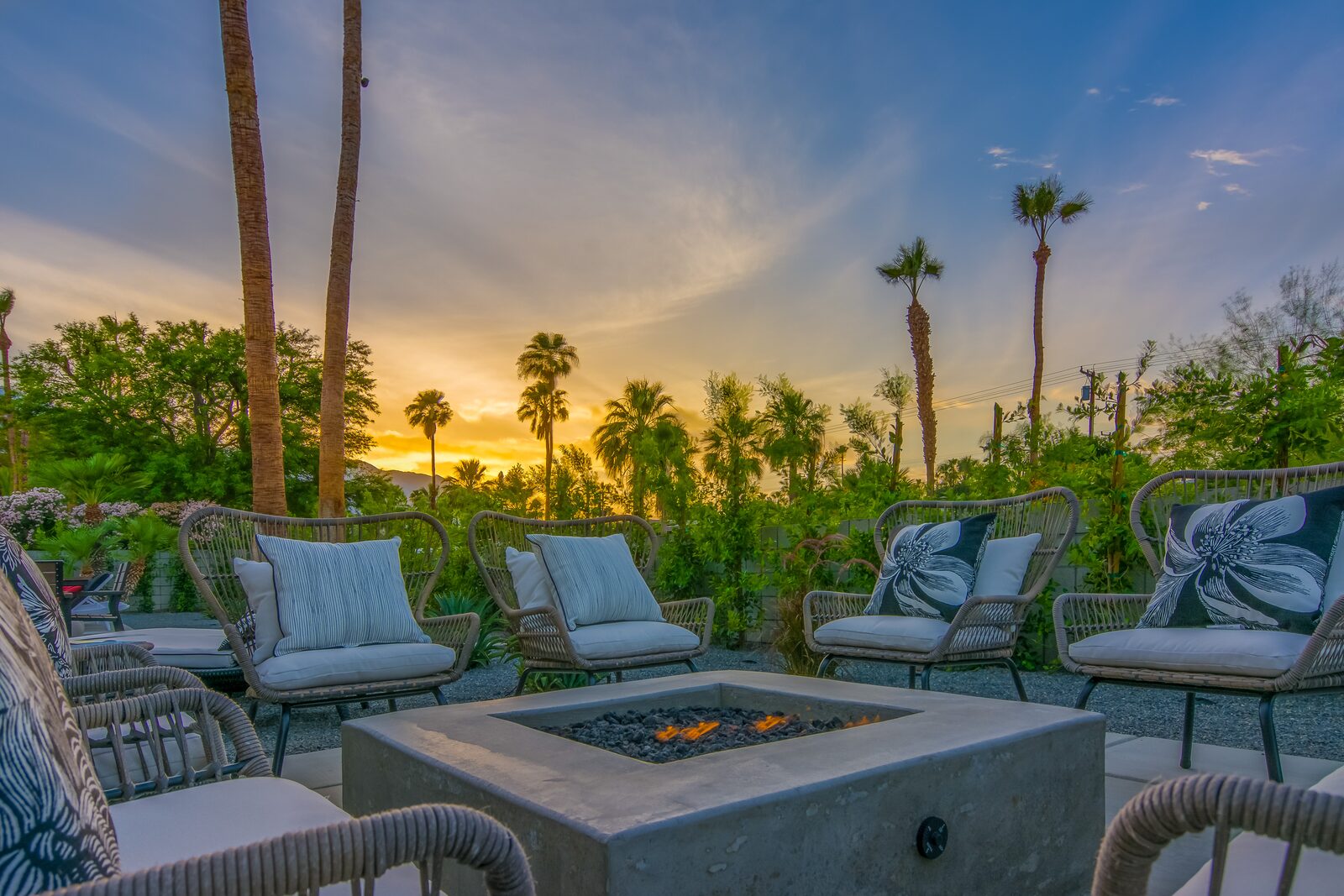 5 Palms Estate bedroom with pool view and warm bedding