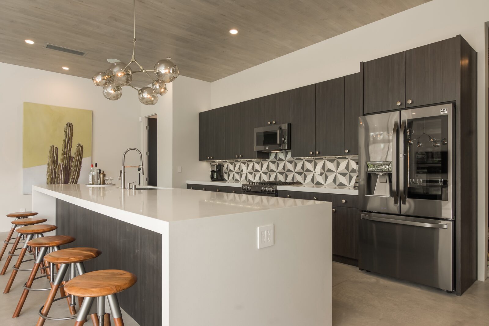 5 Palms Estate chef's kitchen with counter stools