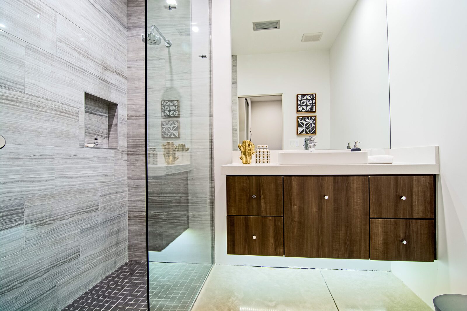 5 Palms Estate en-suite bathroom with wood vanity and rain shower