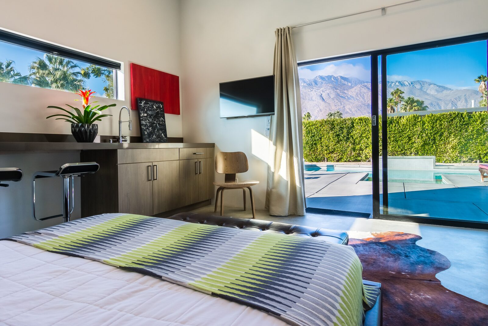 Palms at Park Villa guest bedroom with mountain view and en-suite access