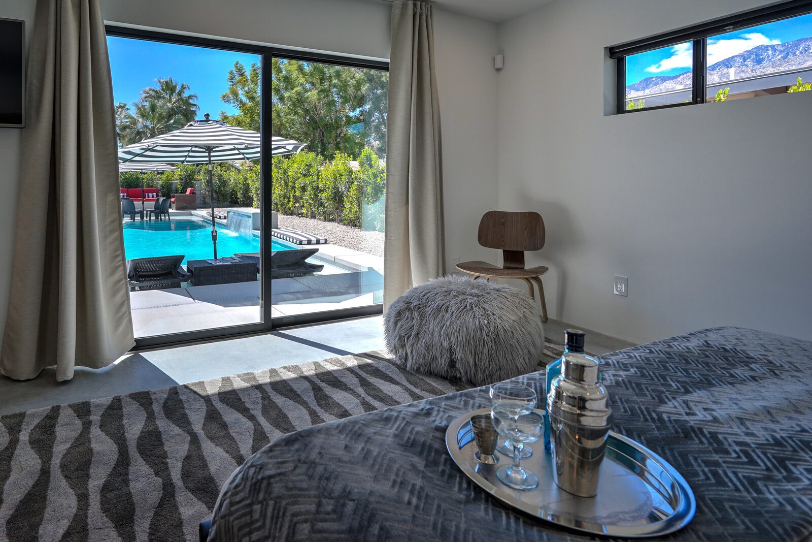 Palms at Park Villa guest suite with sliding doors to the pool