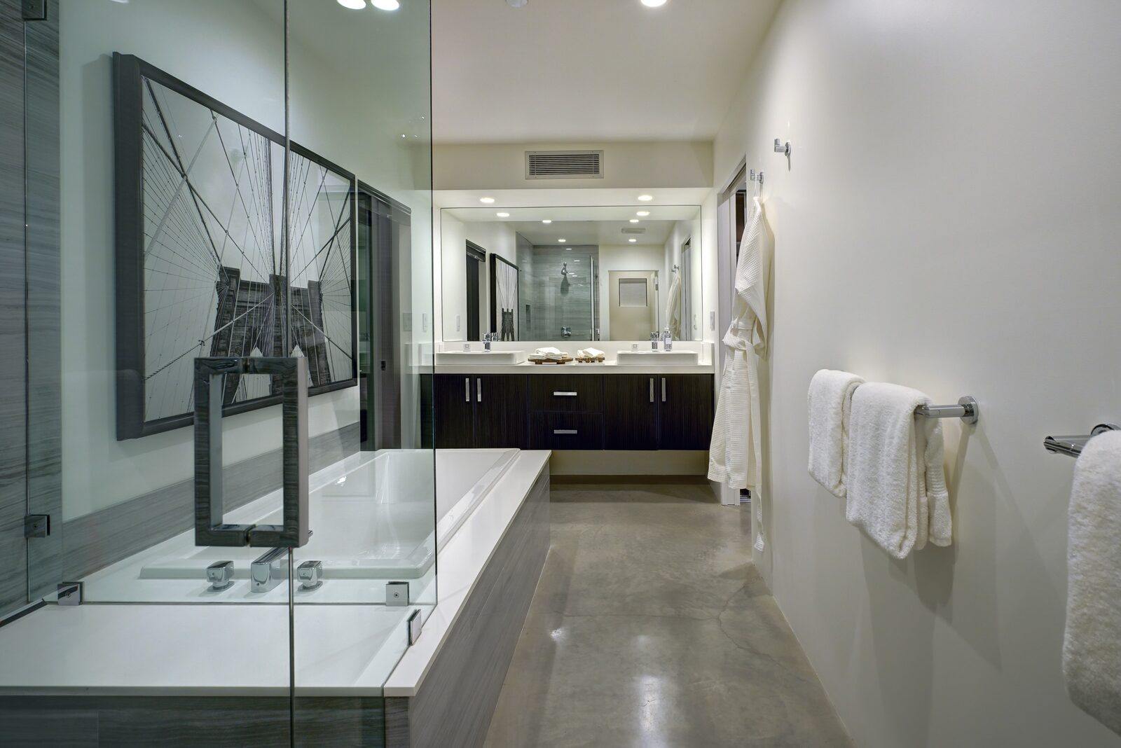 Palms at Park Villa bathroom with dark tile and plush towels