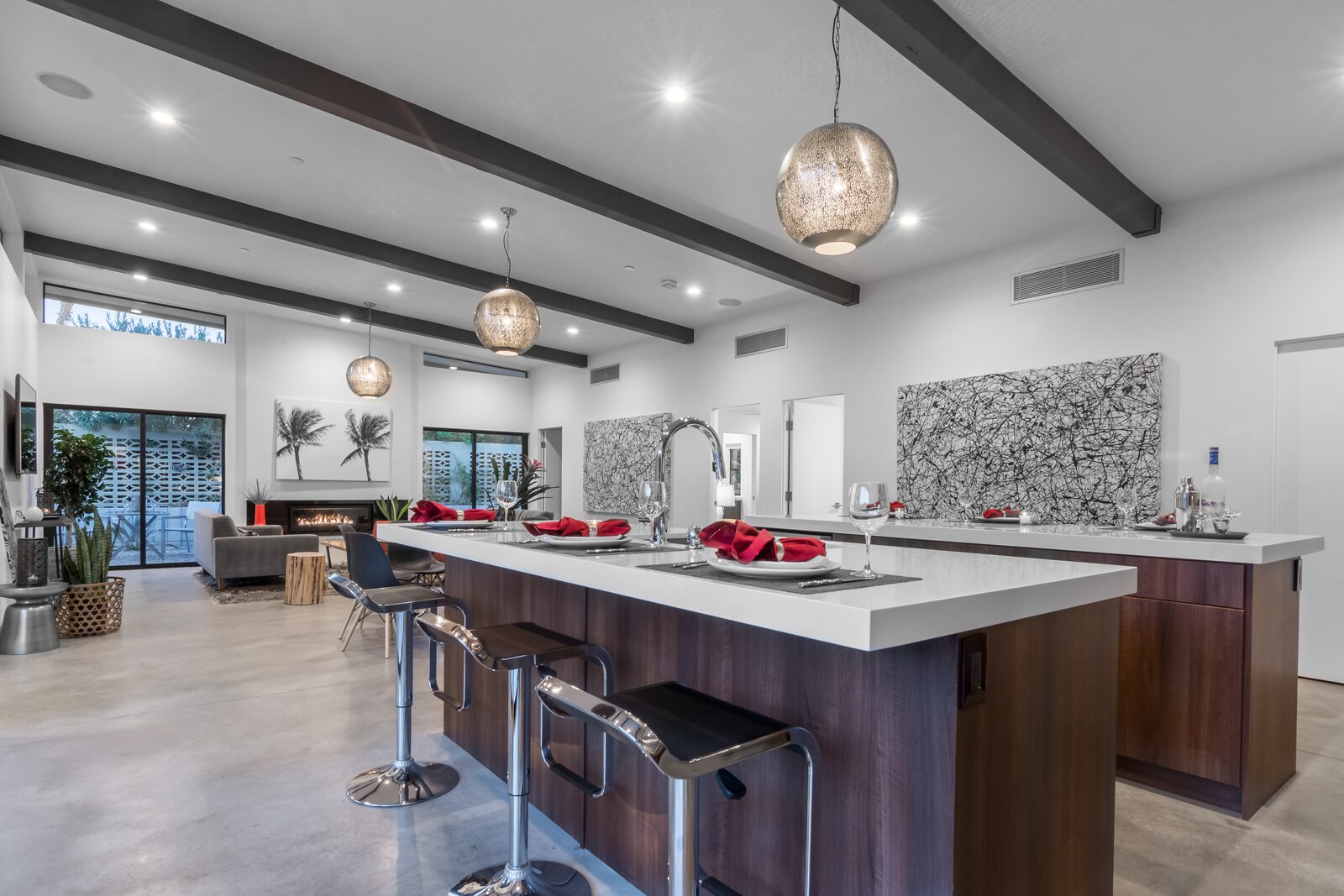 Palms at Park Villa chef's kitchen with pendant lights and dual islands